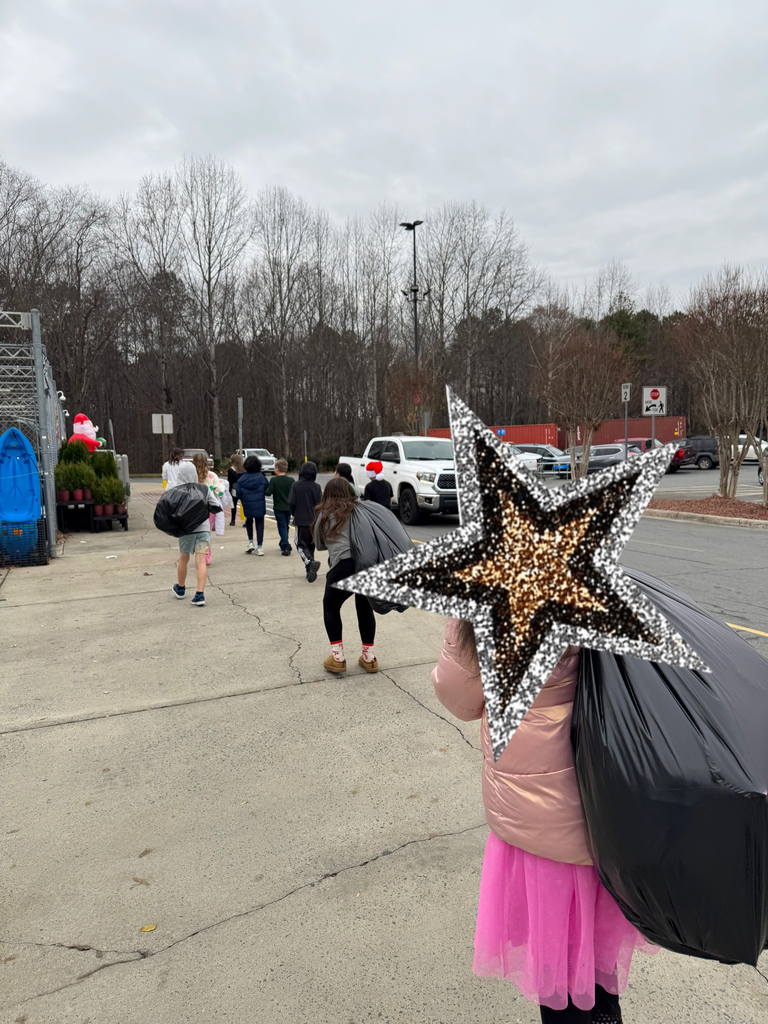 students walking through the Wal-mart parking lot