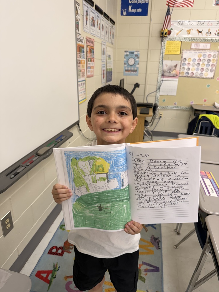 student with his published book