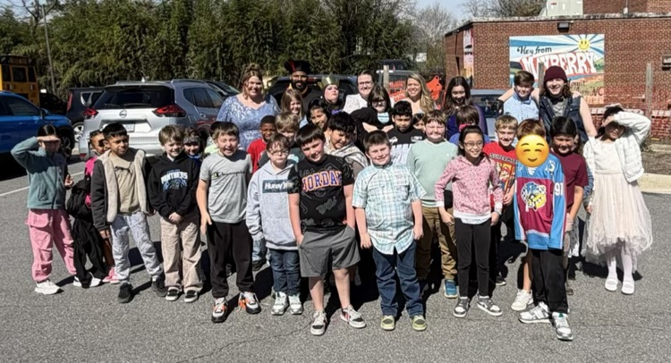 students smiling with the cast of Disney The Descendants