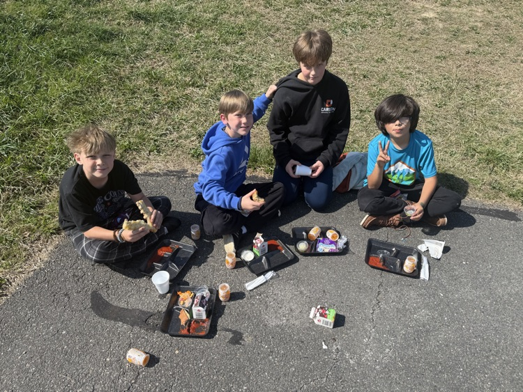 students enjoying popsicles outside