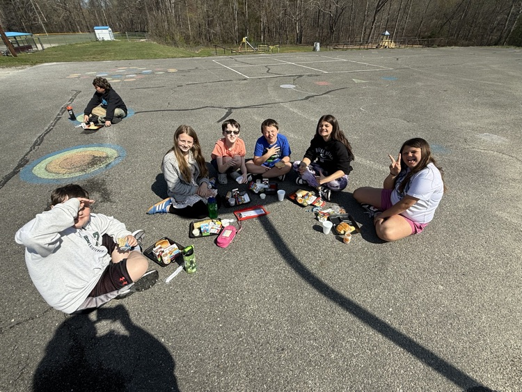 students enjoying popsicles outside