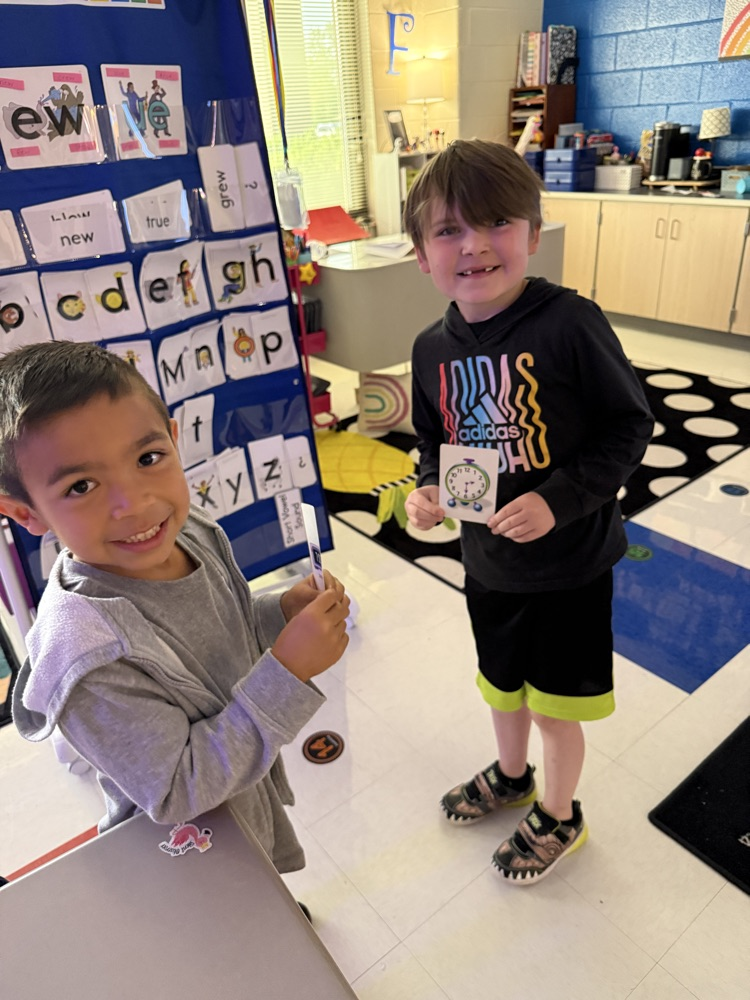 students practicing telling time 