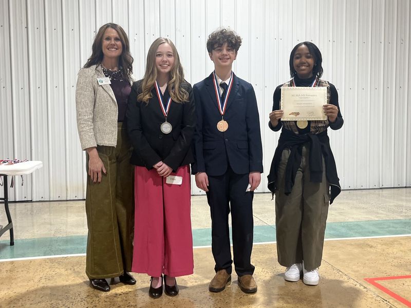 Dramatic Interpretation Photo (l-r): Dr. Shelley Goins, Director of Secondary Curriculum and Accountability, Jaden Elliot, Drew Goins, and Hasanah McCall