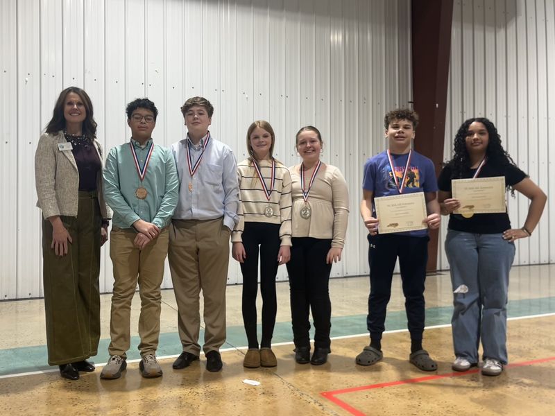 Duo Interpretation Photo (l-r): Dr. Shelley Goins, Director of Secondary Curriculum and Accountability, Halen Turner, Gabriel Nance, Emarie Lowe, Kennedy Davis, Malakai Smith, and Selena Castano.
