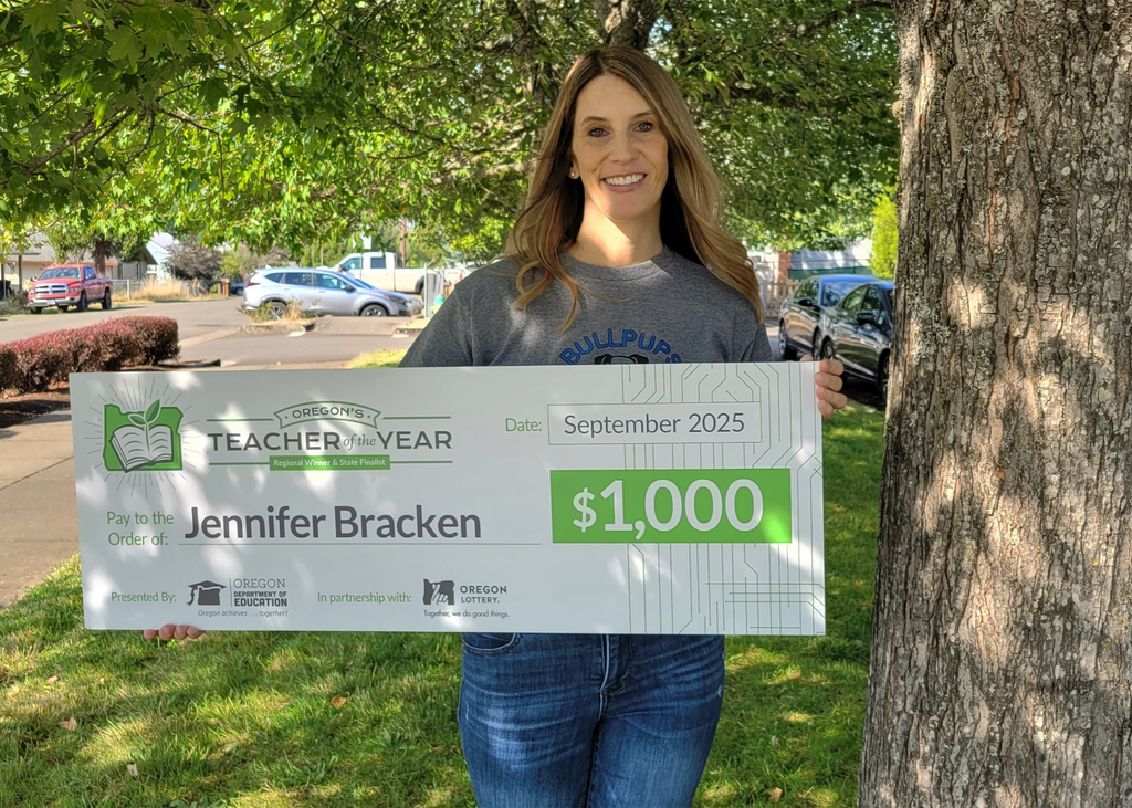 Jennifer Bracken with Check