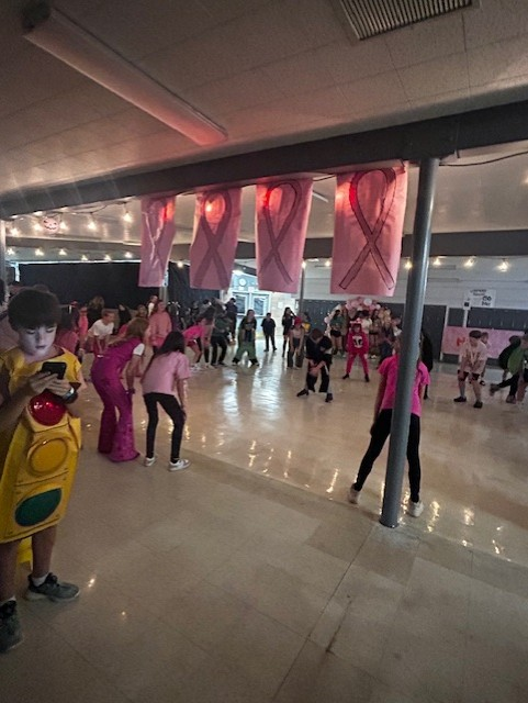 Students Dancing at the Pink Halloween Dance
