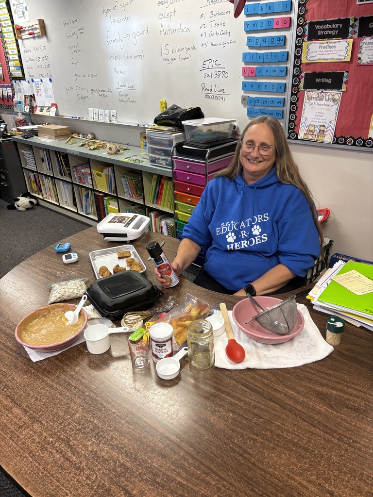 Teacher surrounded by baking supplies 