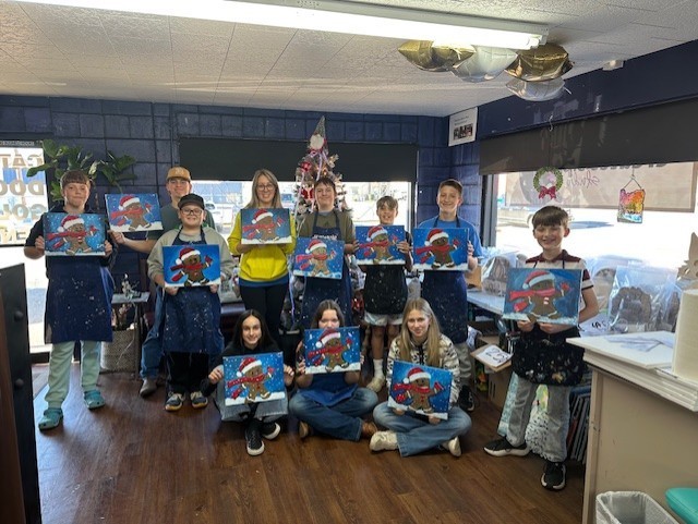 The group of Leadership kids with their masterpieces.