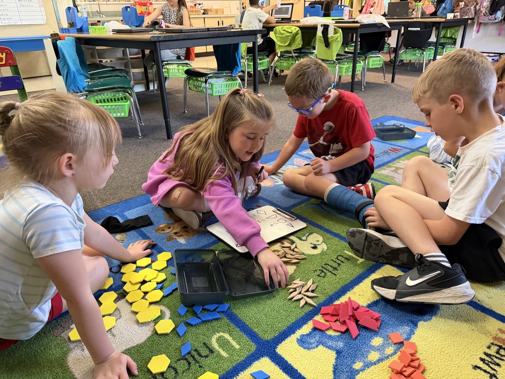 Photo of kids playing with math manipulatives