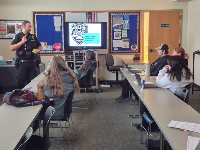 Officer Fox teaching internet safety.