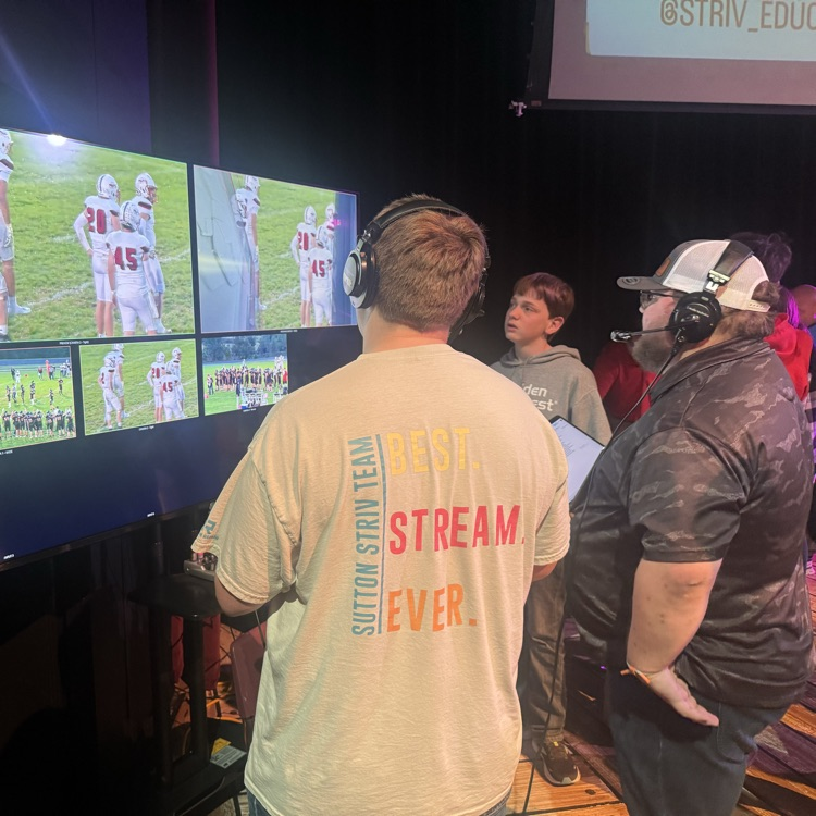 Chris Hetrick practices broadcasting with Nathan Ladehoff.