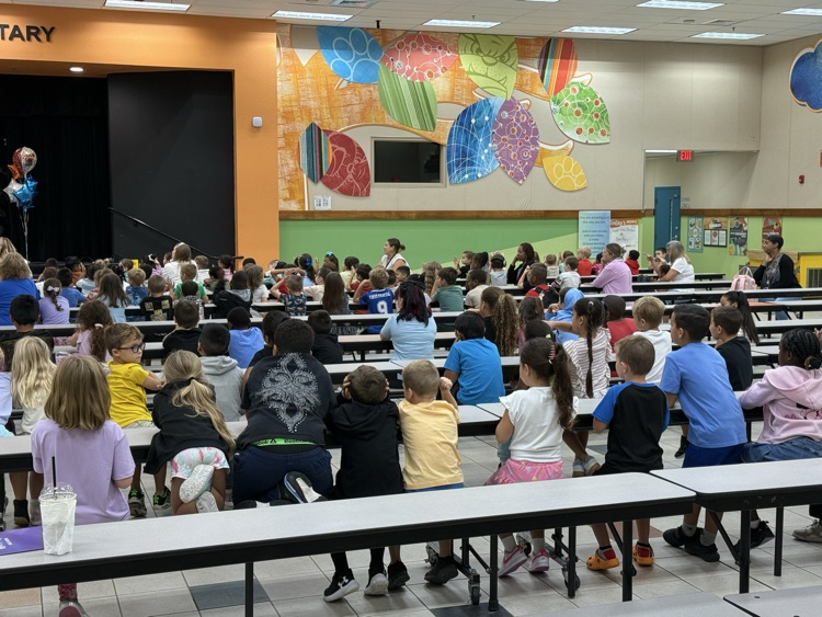 Students watching the NED Show  