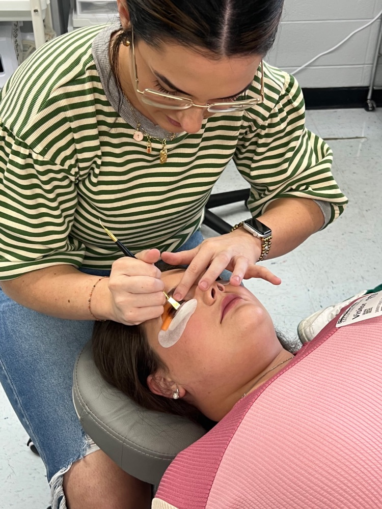 Abi Wynn giving facial - 1