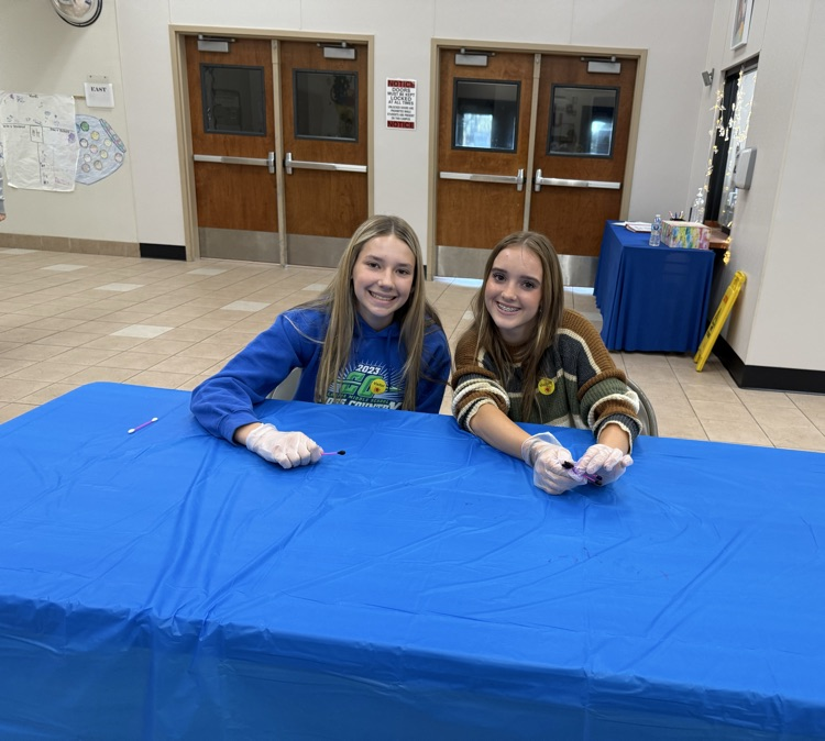 Interact members serving on Purple Pinkie Day