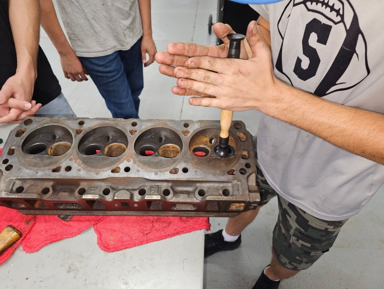 master automotive students doing hands-on activity