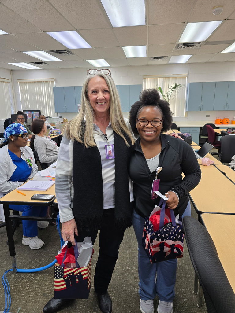 nursing instructor with student