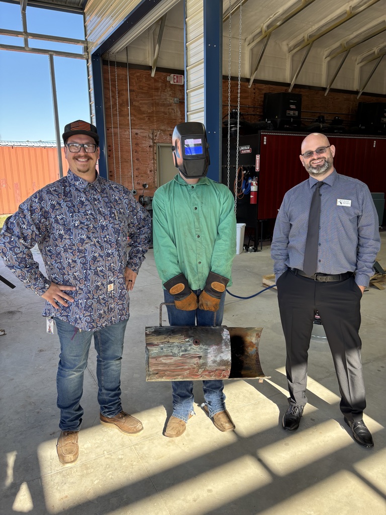 Mark Harrison with BHS welding instructor and student