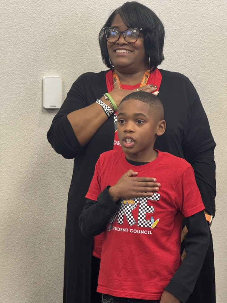 student leading the pledge