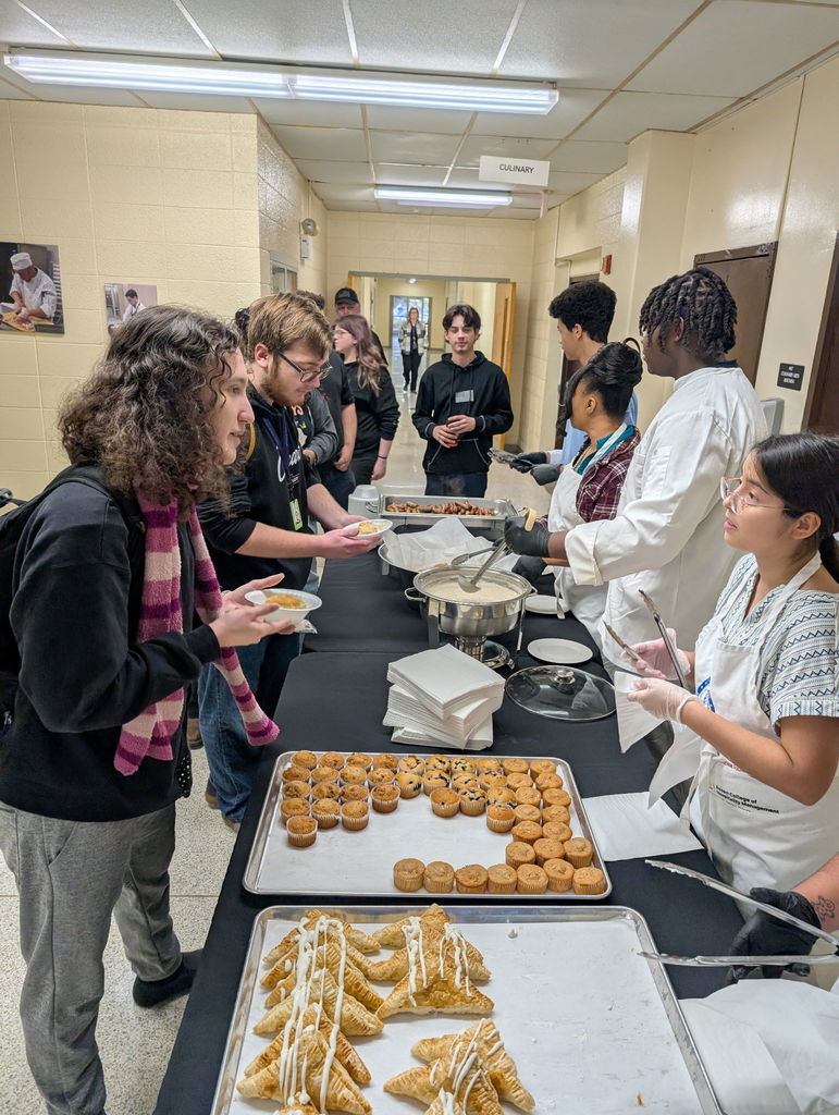 Students in line selecting what they want for breakfast
