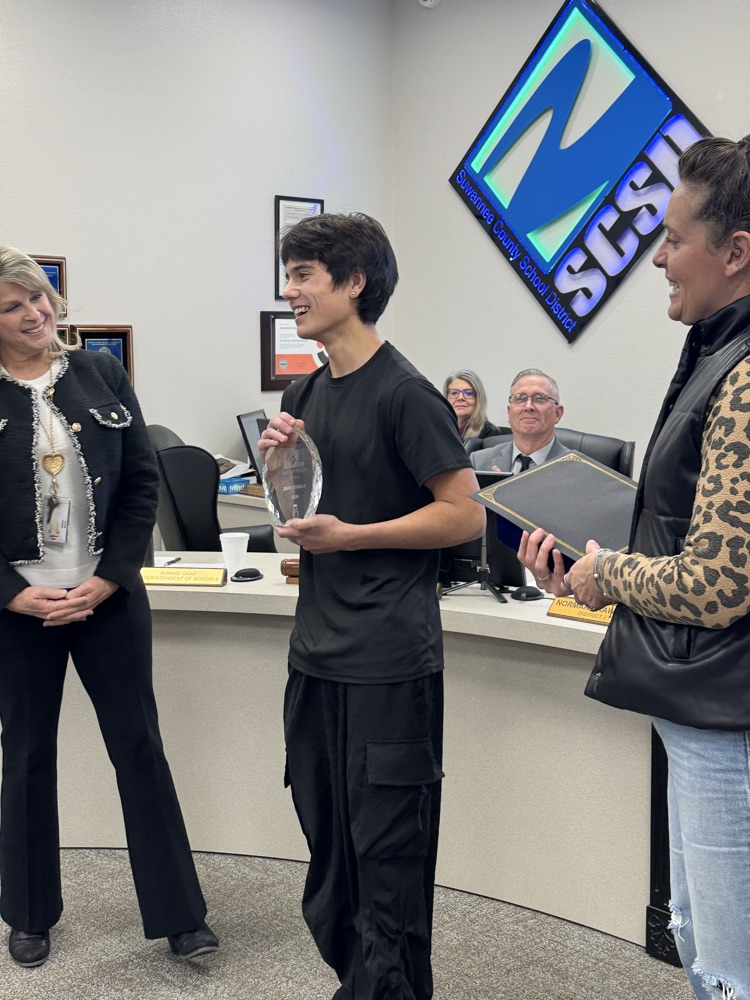 Zakk Wimbledon poses with his award