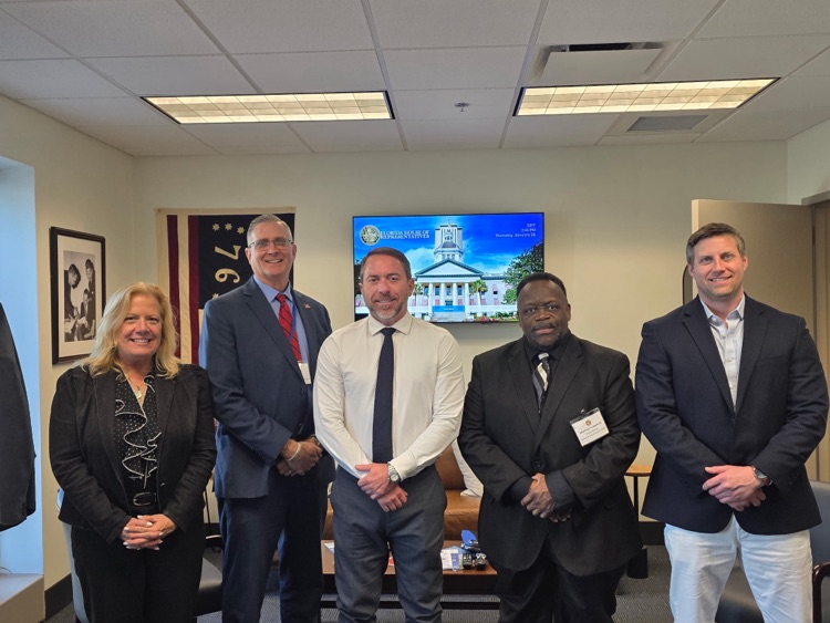 RIVEROAK posing for photo