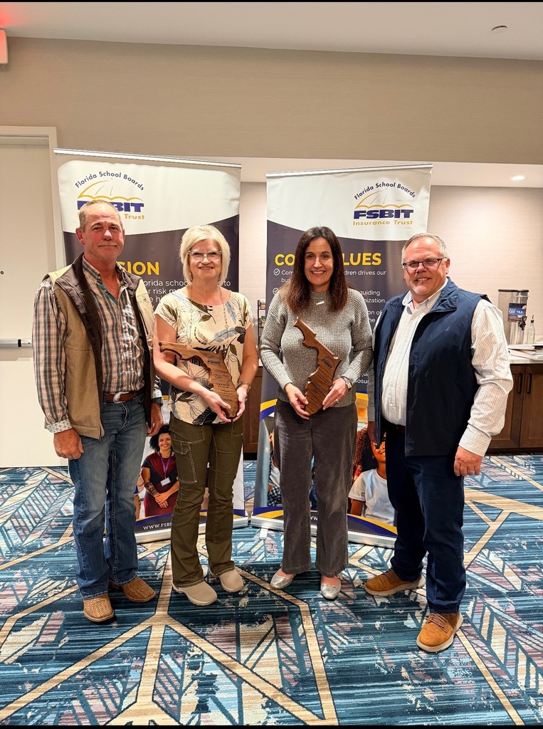 Lorie Norris, Marsha Brown with Ronald White and FSBIT Representative