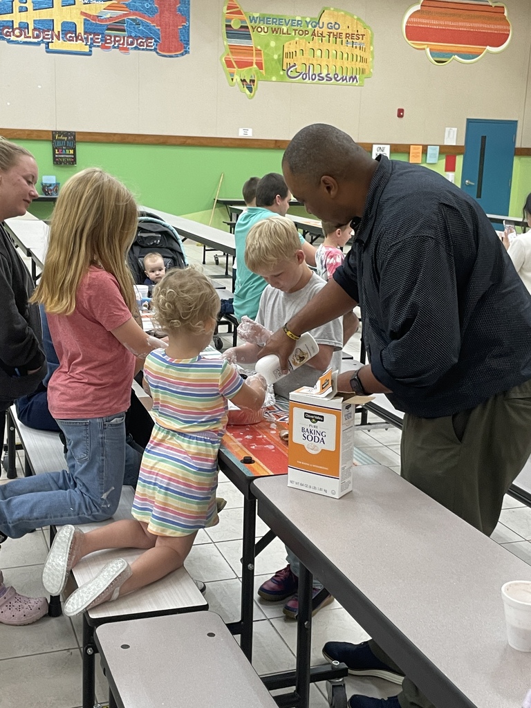 Students building snowmen at the Blizzard of Brilliance Event