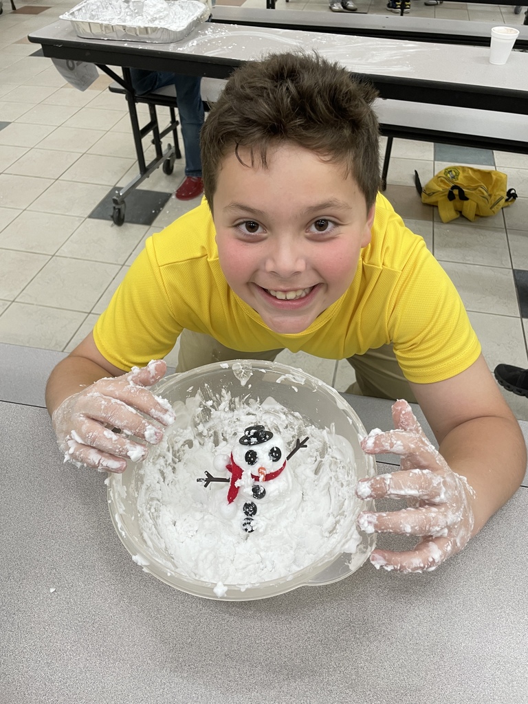 Students building snowmen at the Blizzard of Brilliance Event