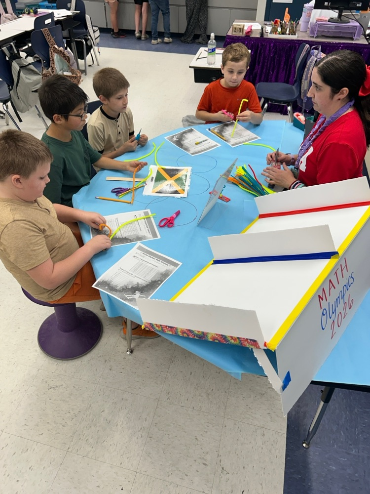 students engaged with teacher 