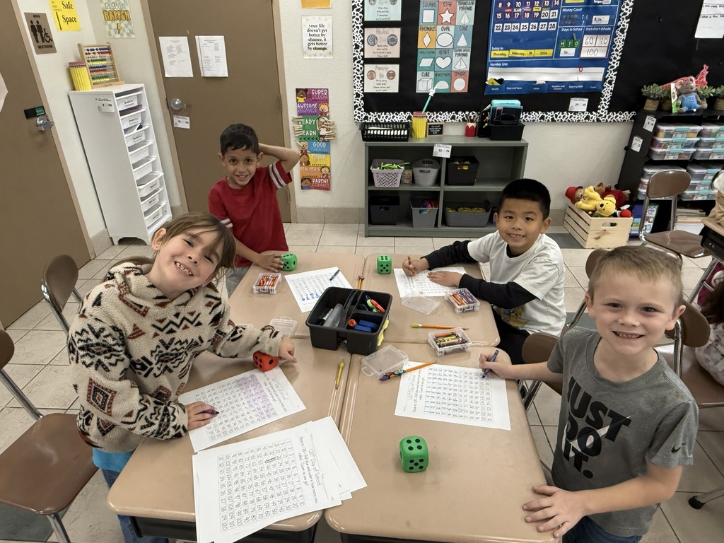 120th Day of school Escape room students working on math challenges