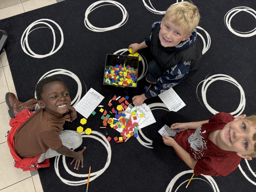 120th Day of school Escape room students working on math challenges