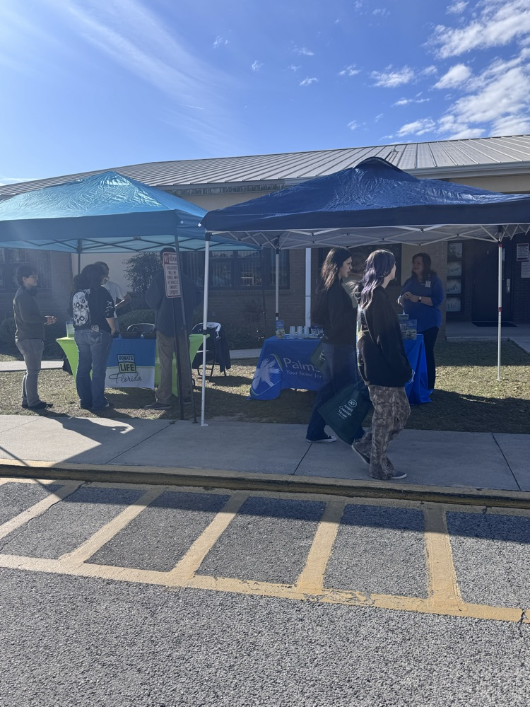 students exploring booths