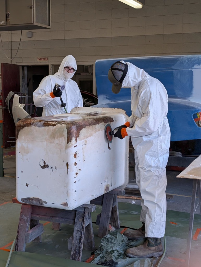 Fiberglass repair on a rusted out tub in auto collision - 6