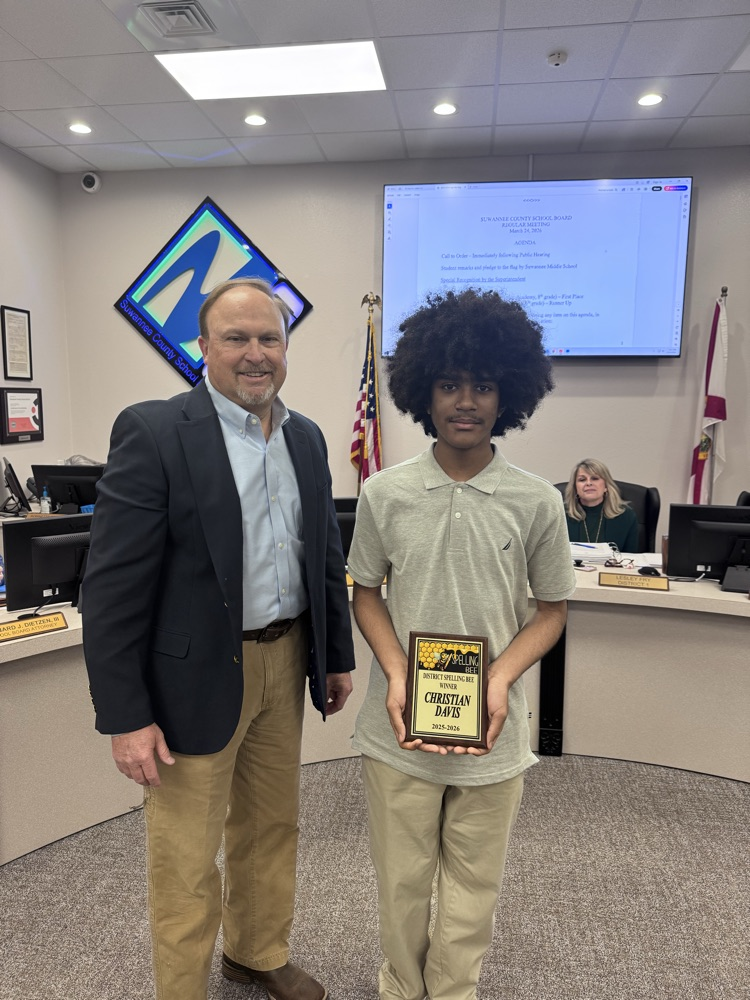 first place winner at spelling bee - Christian Davis