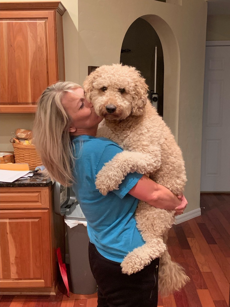 Mrs. Beach and her sweet doggie, Bear.
