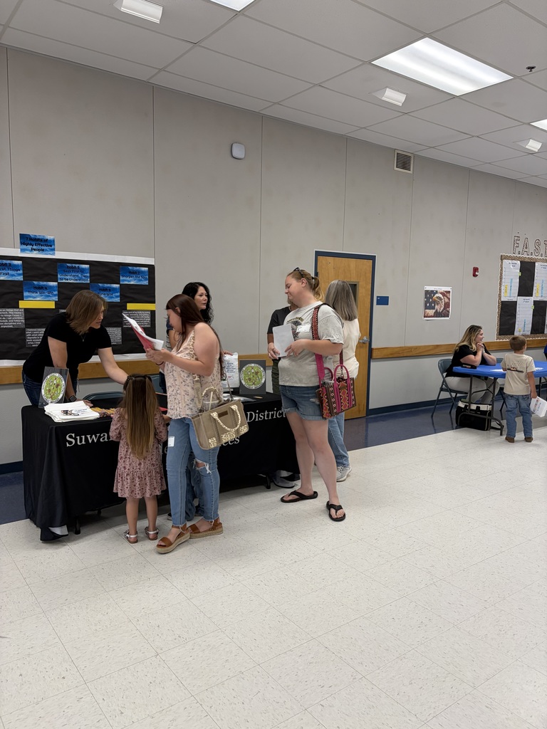 Families interacting with the SCSD Student Services staff