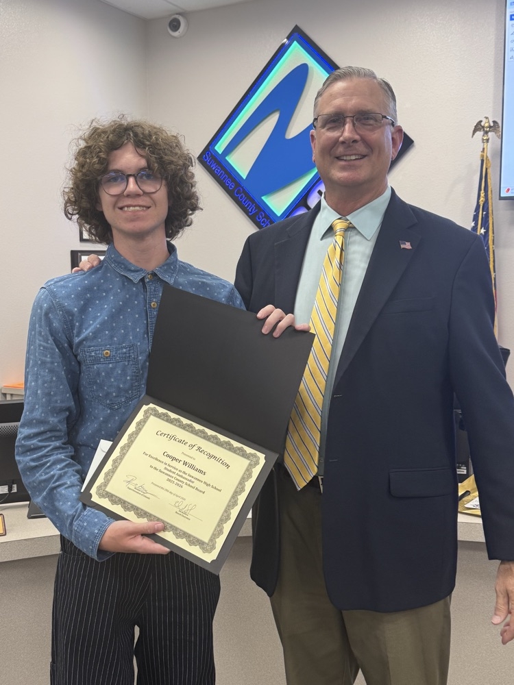 SHS Student Ambassador, Cooper Williams, posing with Chairman daSilva 