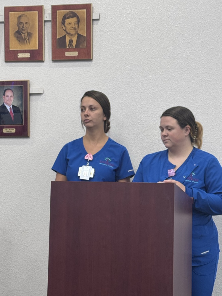 Practical Nursing students speaking to the board  