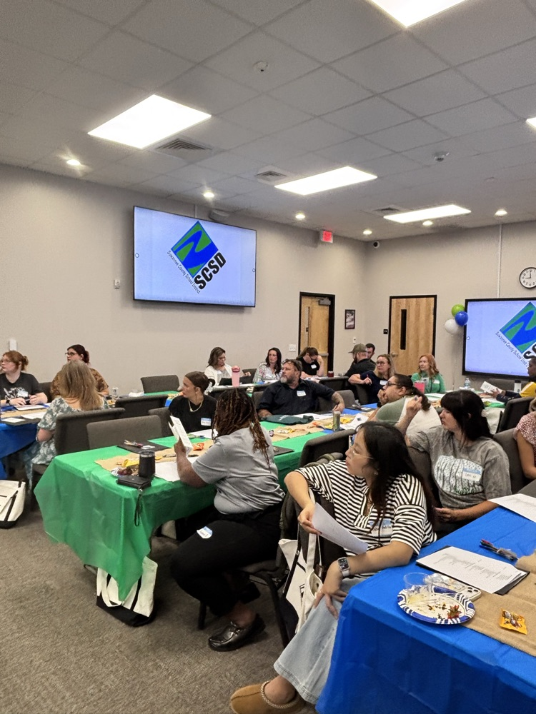 new hires listening to speaker 