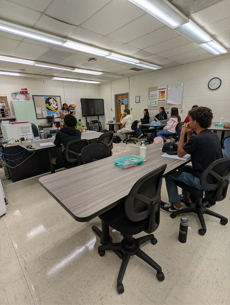 automotive students at desk