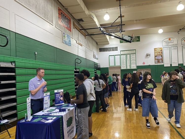 2026 College fair, students are visiting various informational booths about colleges around the southeast as well as representatives from military branches.