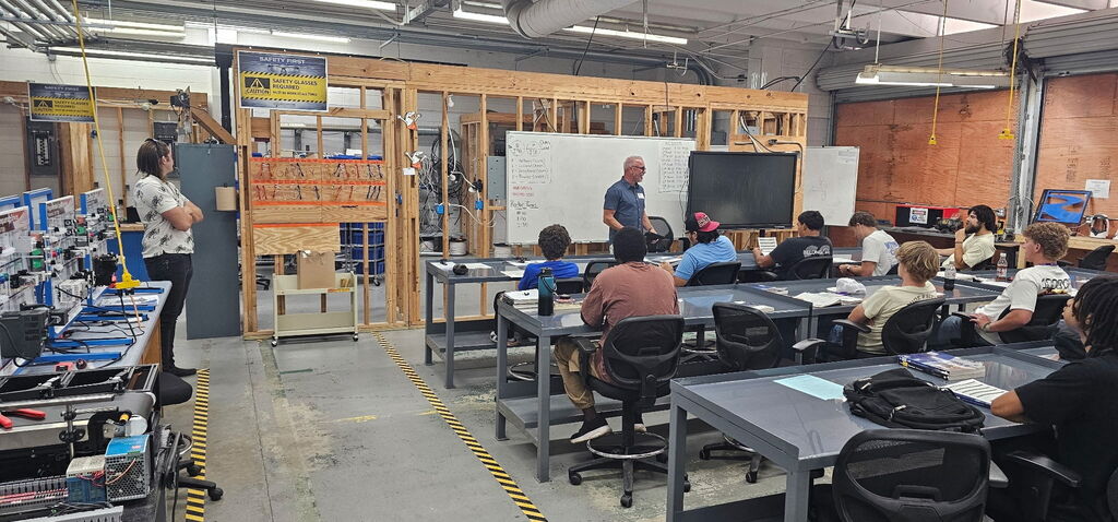 Students listening to a presentation in a classroom 