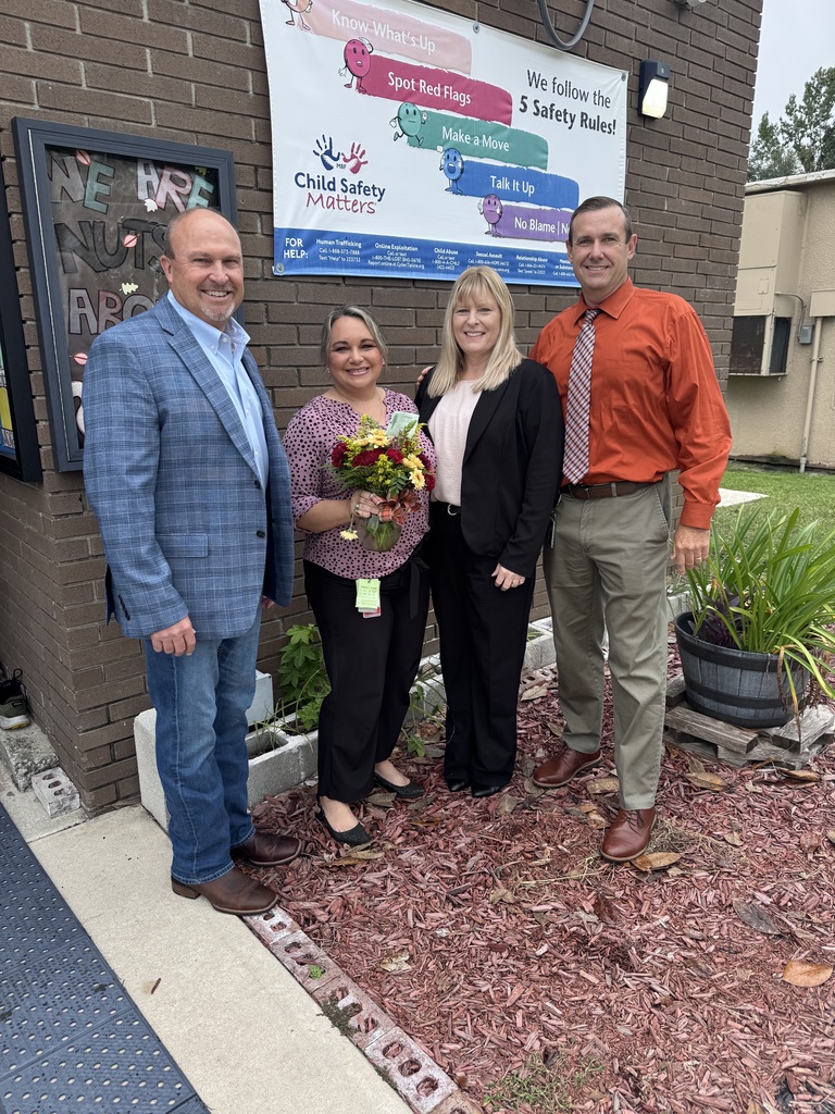 Brooke Cox-Knowles of Suwannee Opportunity School, our Principal of the Year, with Superintendent Gray and Assistant Superintendents Barrs and Wilkerson