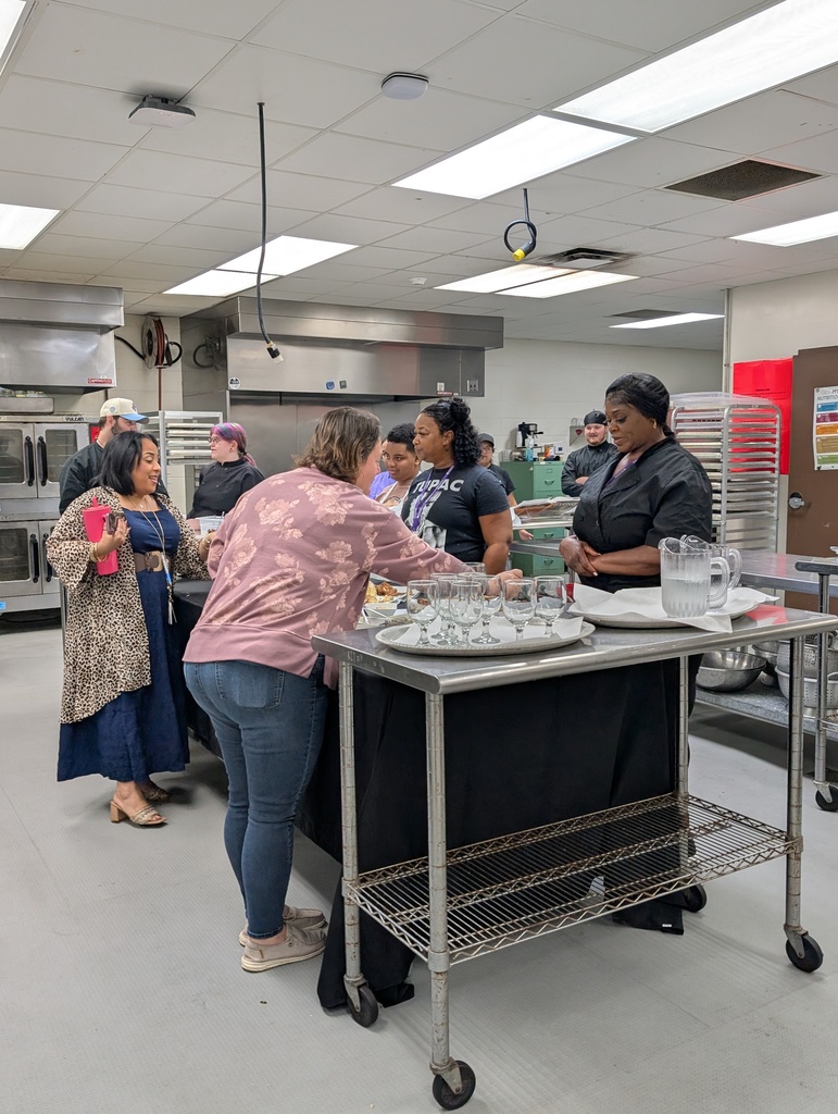 Staff taste testing dishes