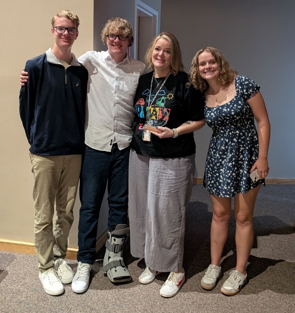 two teenage boys, two adult females