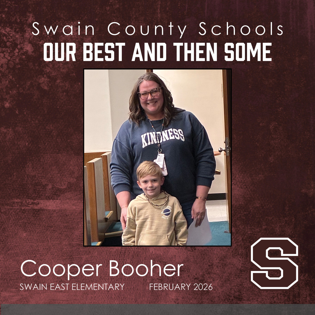 Cooper Booher: A young boy with blonde hair wearing a tan hoodie stands in front of a smiling woman with glasses and long brown hair wearing a blue sweatshirt that says "KINDNESS."