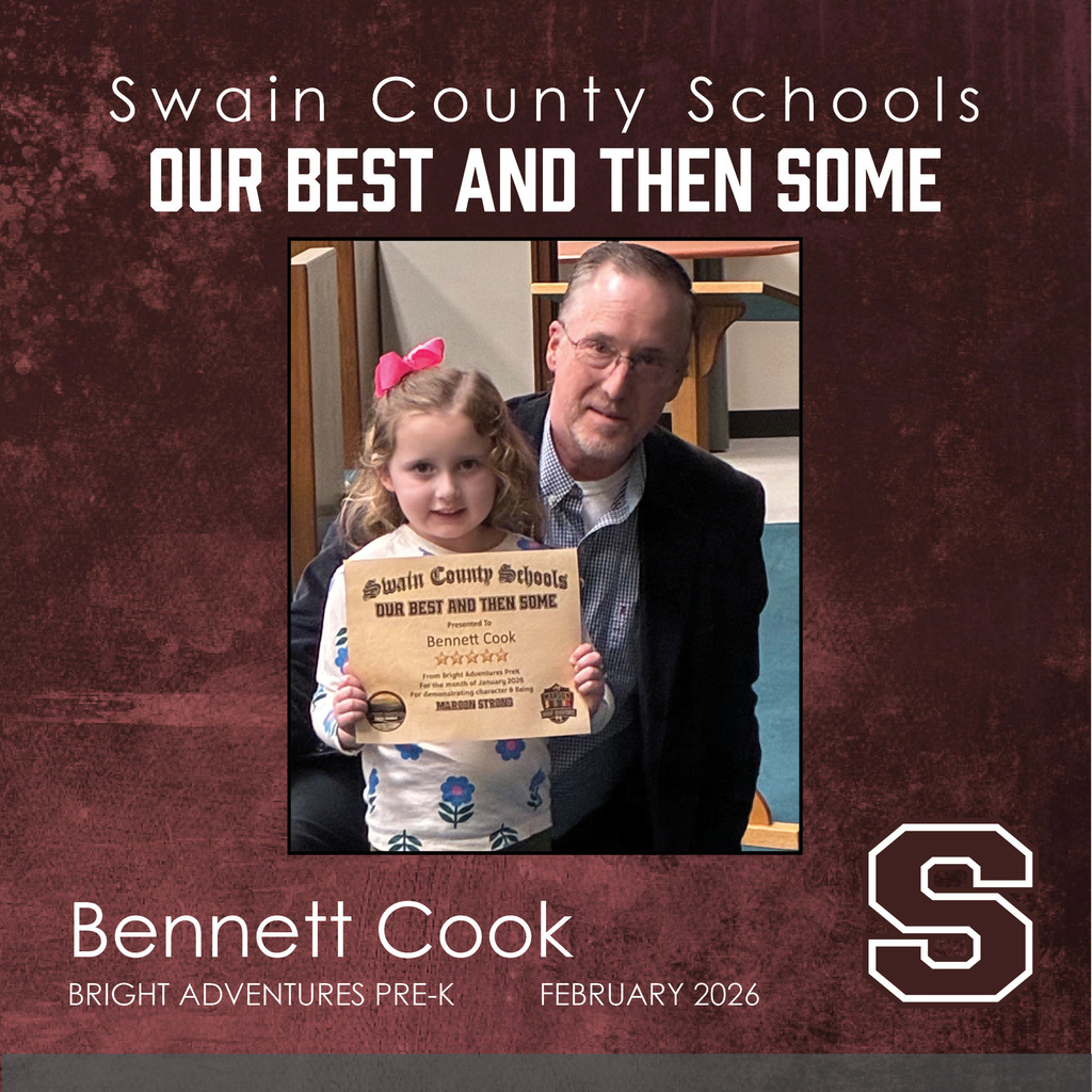 A young student from Bright Adventures Pre-K, Bennett Cook, is being recognized by Swain County Schools for their "Our Best and Then Some" award in February 2026. In the center of the image, Bennett—a young child with curly blonde hair and a bright pink bow—proudly holds an award certificate. Standing behind Bennett is an adult man with glasses and a dark blazer.