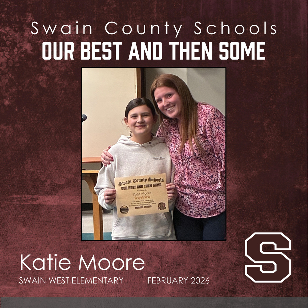 Katie Moore: A young girl in a light grey hoodie smiles while holding her award. Standing next to her with an arm around her shoulder is a smiling woman with long reddish-brown hair wearing a pink and purple patterned blouse.