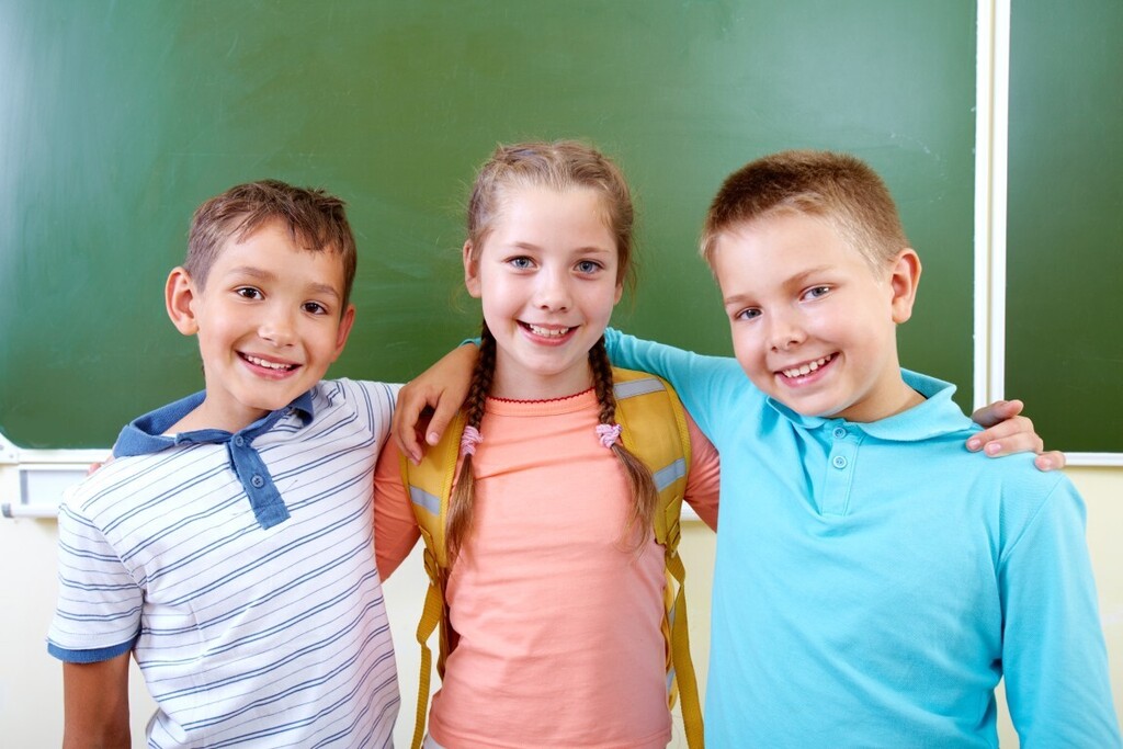 three elementary school kids