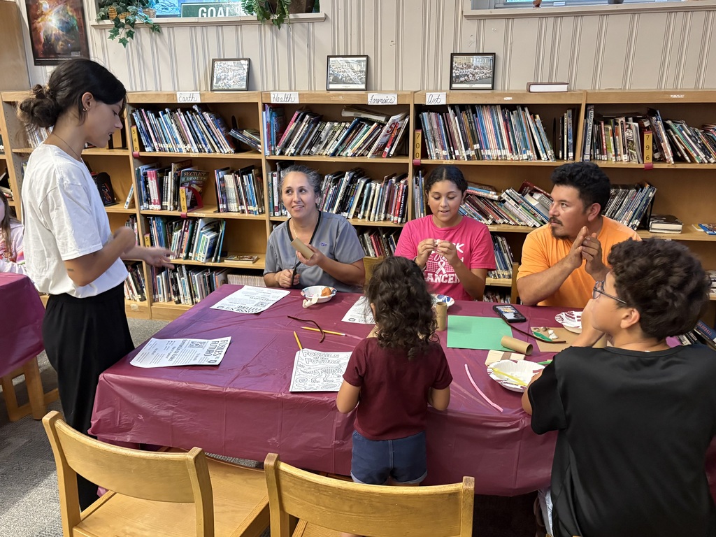 Families and staff participate in dinner and learning activities during October Parent Night at Swain Middle School.